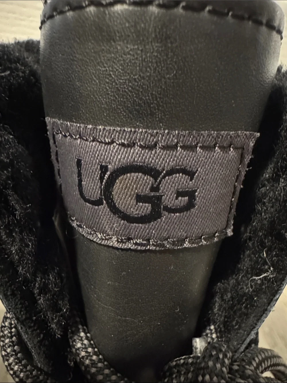 UGG Adirondack water proof insulated lace up winter boots.